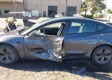 2021 Tesla Model 3 из США, поврежденный, VIN 5YJ3E1EA8MF974161